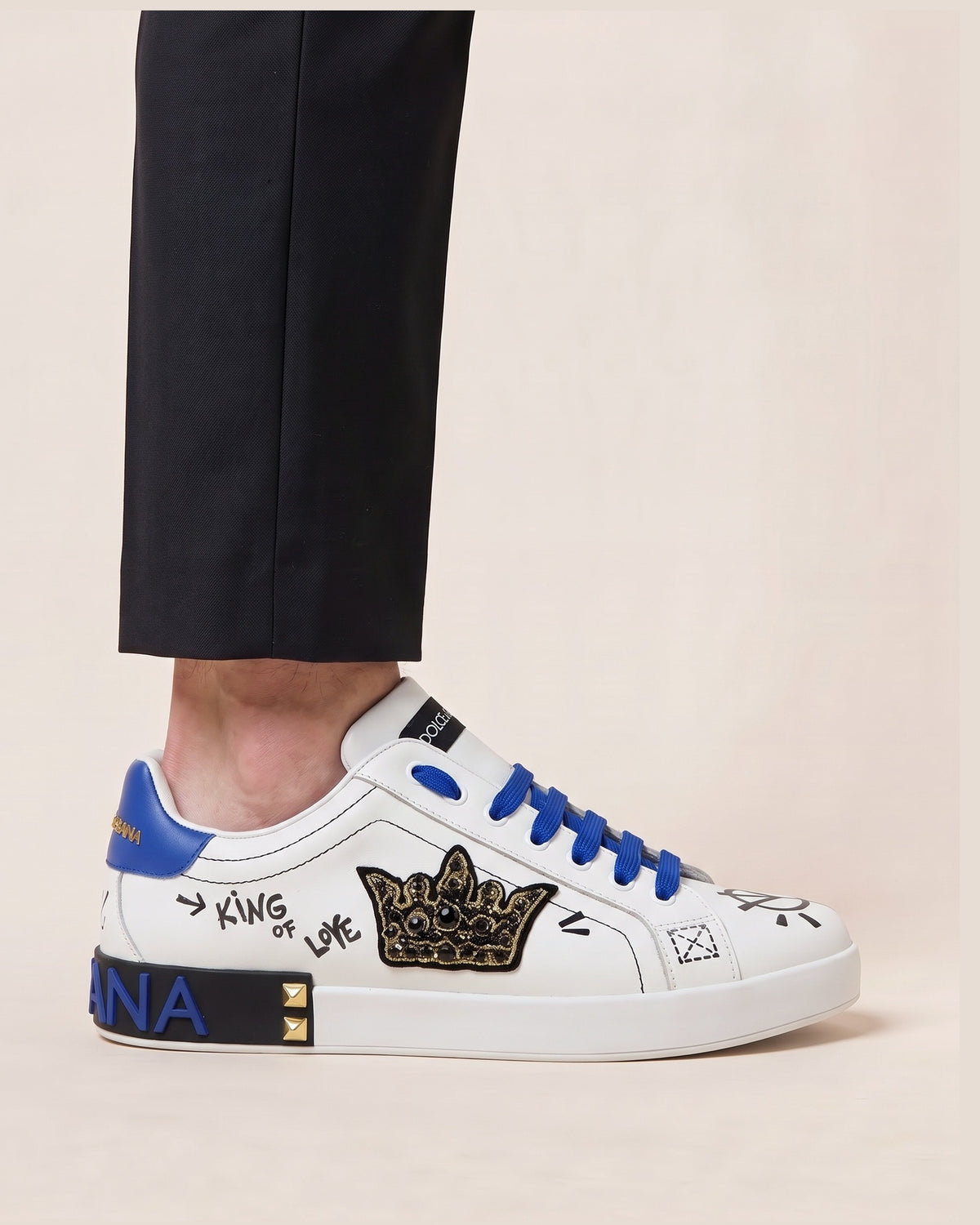 Dolce & Gabbana Portofino sneakers in white leather with graffiti print and crown patch