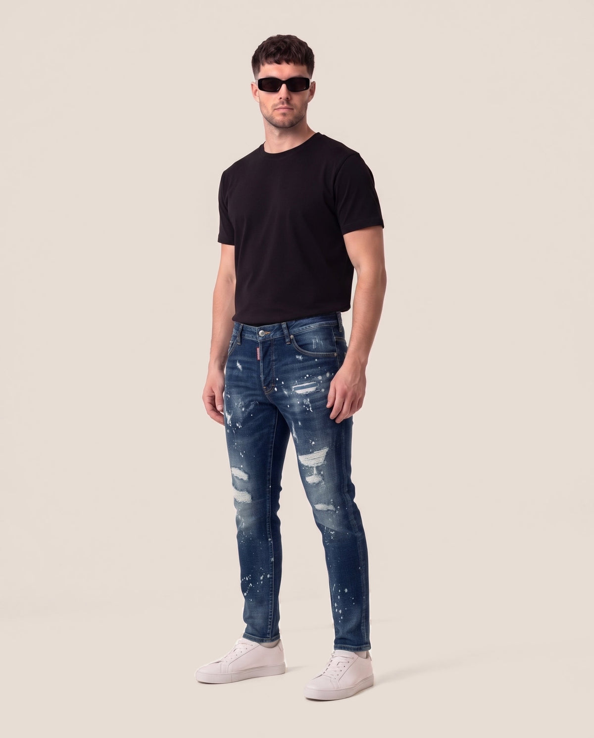 Dsquared2 modre kavbojke z raztrganinami in packami barve, sprednji pogled