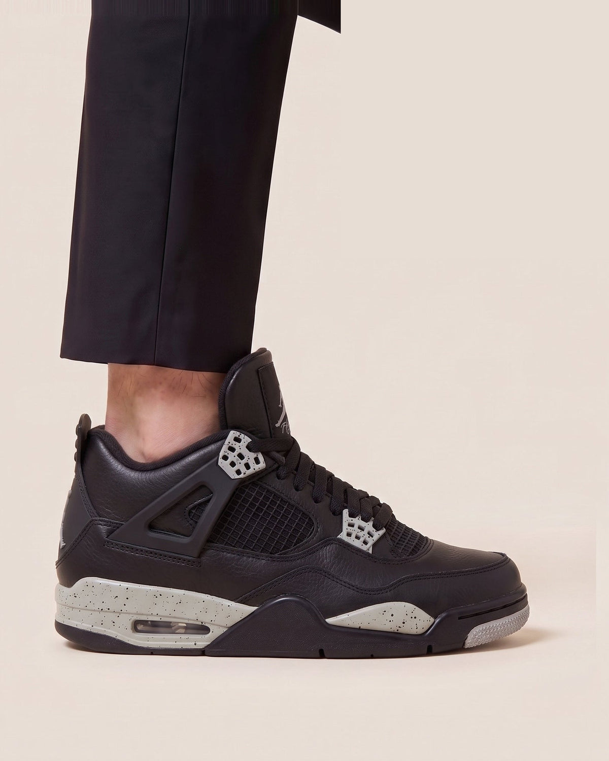 Air Jordan 4 black with sail sole