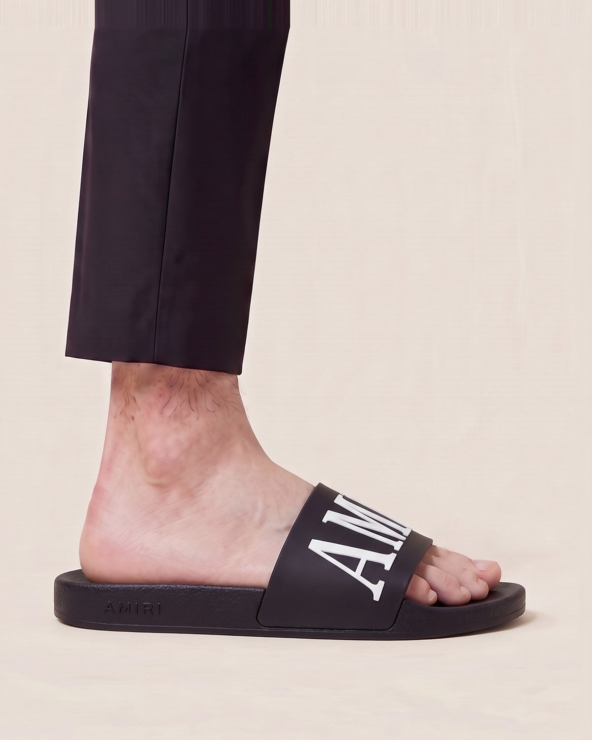 Amiri slides with white logo