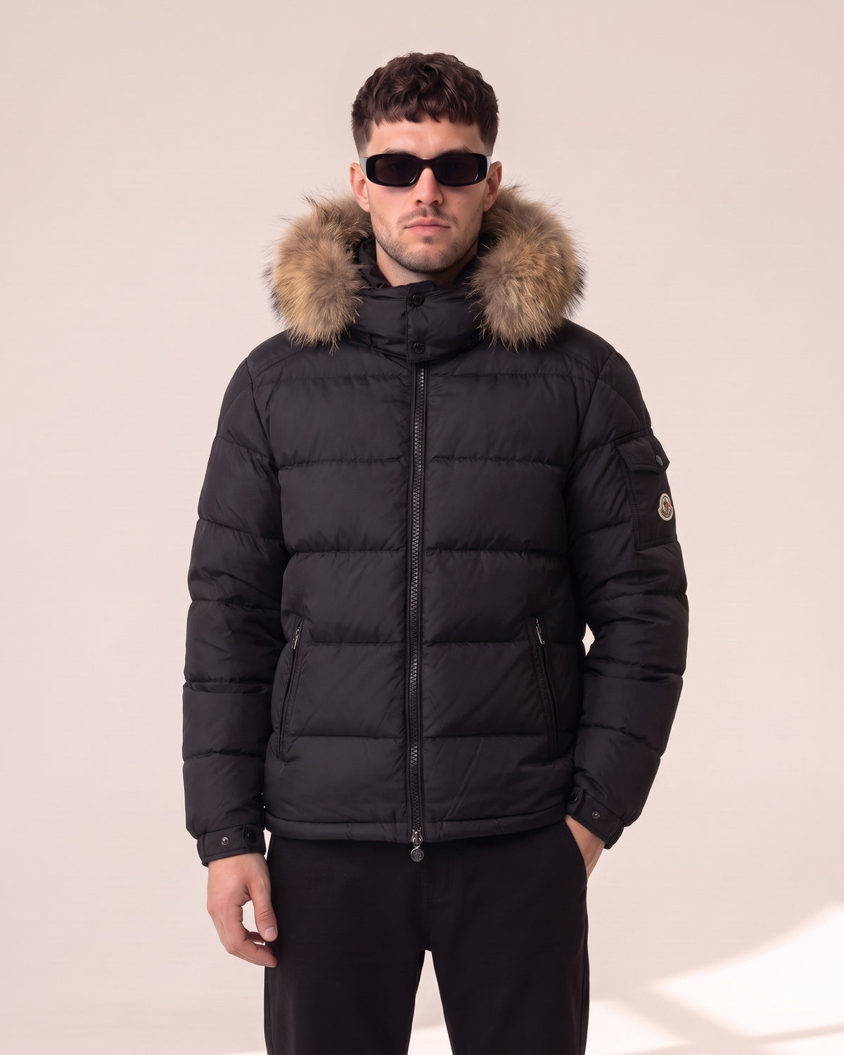 Moncler hooded down jacket with fur trim in black