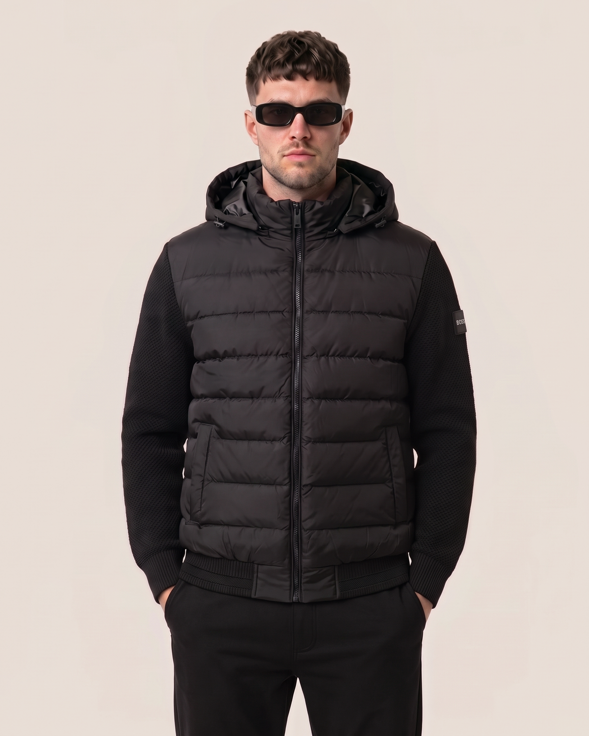Hugo Boss hybrid puffer jacket with knit sleeves in black